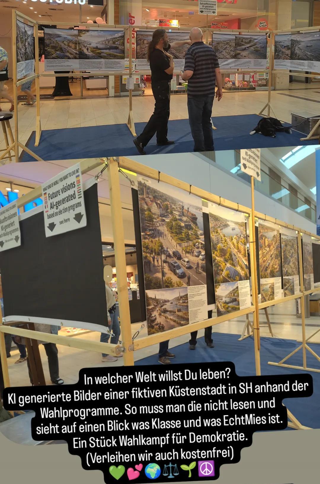 Zwei Menschen betrachten Bilder der Ausstellung
